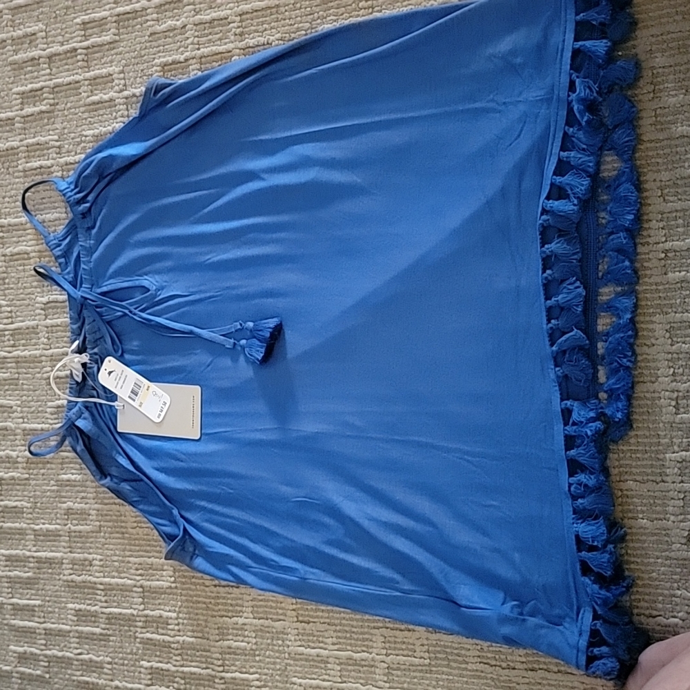 NEW TOMMY BAHAMA top with tags. This top is blue in size medium. NEW TOMMY BAHAM